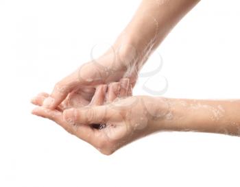 Woman washing hands on white background�