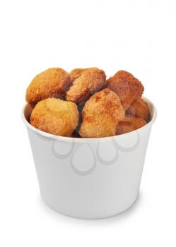 Tasty nuggets in paper bowl on white background�
