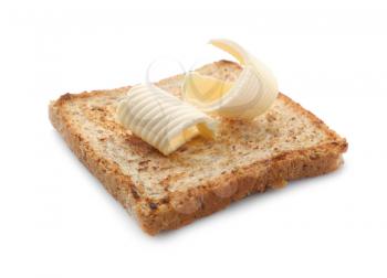 Tasty toasted bread with butter curls on white background�