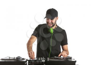 Male DJ playing music on white background�