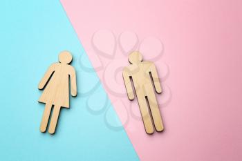 Female and male figures on color background. Concept of transgender�