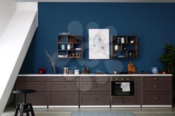 Modern interior of kitchen with stylish furniture�