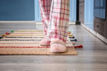 Woman in soft slippers at home�