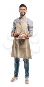 Baker with fresh bread on white background�