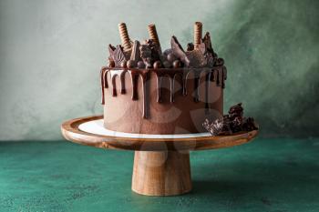 Tasty chocolate cake on table�