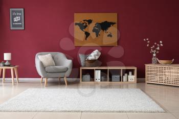 Interior of living room with picture of map on wall�
