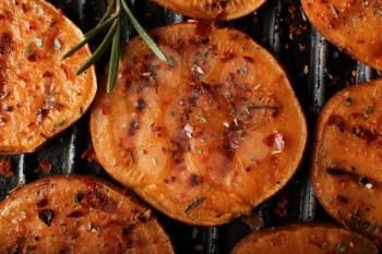 Tasty grilled sweet potato on pan�