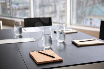 Table prepared for business meeting in conference hall�