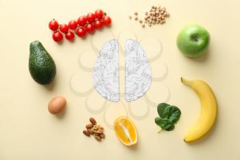 Human brains with different healthy products on color background�