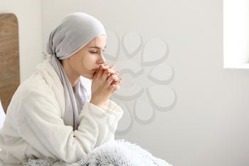 Woman after chemotherapy at home�