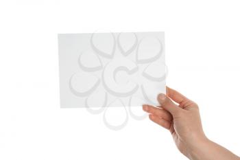 Female hand with blank invitation card on white background�
