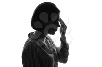 Silhouette of thoughtful young woman on white background�