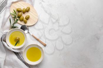 Tasty olive oil on light table�