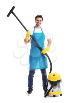 Male janitor with vacuum cleaner on white background�