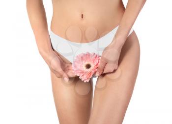 Beautiful young woman with flower on white background. Epilation concept�