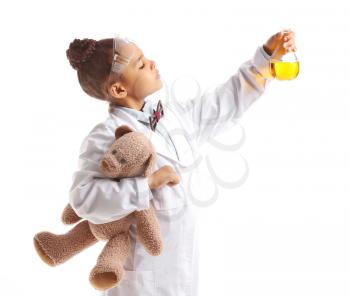 Little African-American scientist on white background�