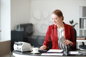 Female accountant working in office�