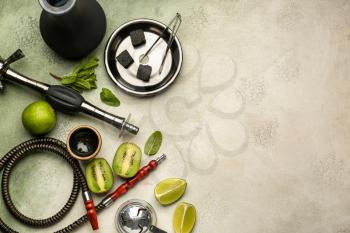 Composition with parts of hookah on light background�