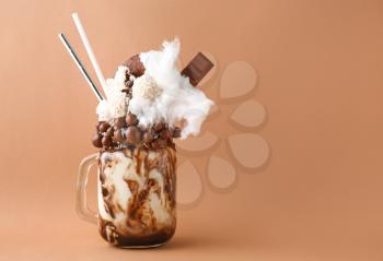 Delicious freak shake on color background�