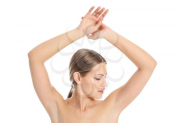 Beautiful young woman after laser hair removal procedure on white background�