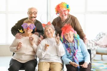 Happy senior people spending time together in nursing home�