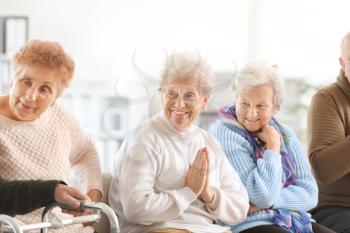 Group of happy senior people in nursing home�