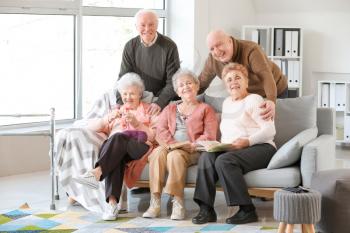 Group of senior people spending time together in nursing home�
