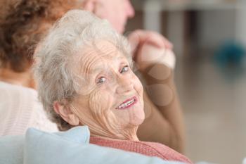 Happy senior woman in nursing home�