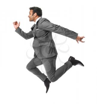Jumping businessman on white background�
