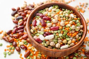 Bowl with different legumes on  table�