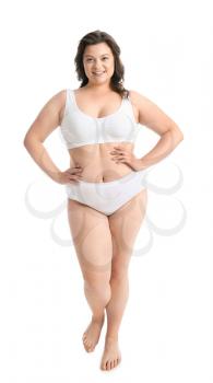 Beautiful plus size woman on white background. Concept of body positive�