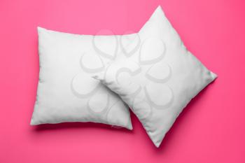 Soft pillows on color background�