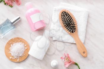 Different cosmetics for personal hygiene on white table�