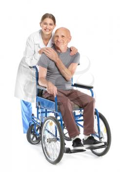 Elderly man with doctor on white background�