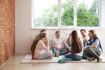 Young people at group therapy session�