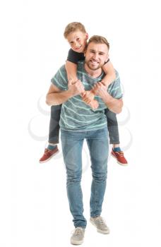 Portrait of happy father and son on white background�