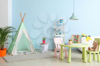 Interior of modern children's room with teepee�