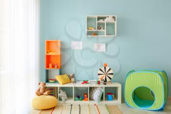 Interior of modern children's room with toys�