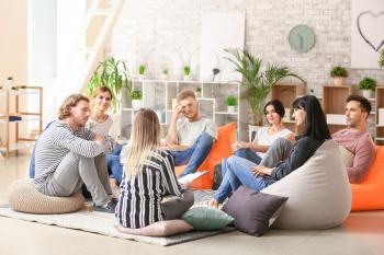 People at group therapy session�