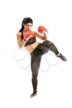 Female kickboxer on white background�