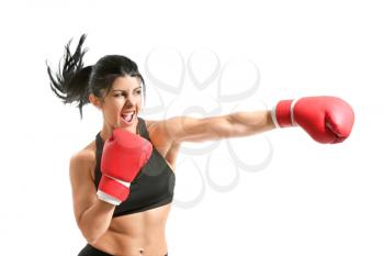 Sporty female boxer on white background�