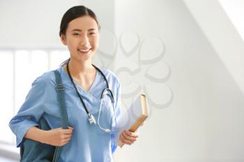 Young Asian student in clinic�