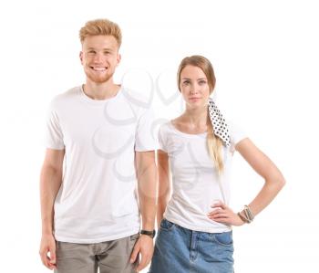 Couple in stylish t-shirts on white background�