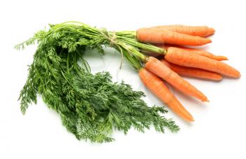 Tasty fresh carrot on white background�
