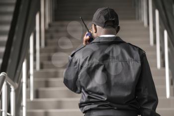 African-American security guard in building�