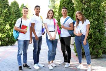 Portrait of young students outdoors�