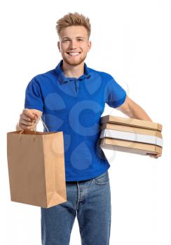 Handsome worker of food delivery service on white background�