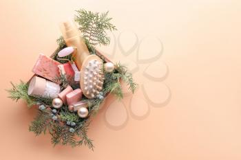 Christmas composition products for spa treatment on color background�