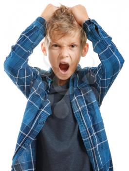 Portrait of angry little boy on white background�