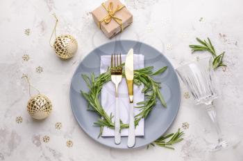 Beautiful table setting for Christmas dinner on light background�